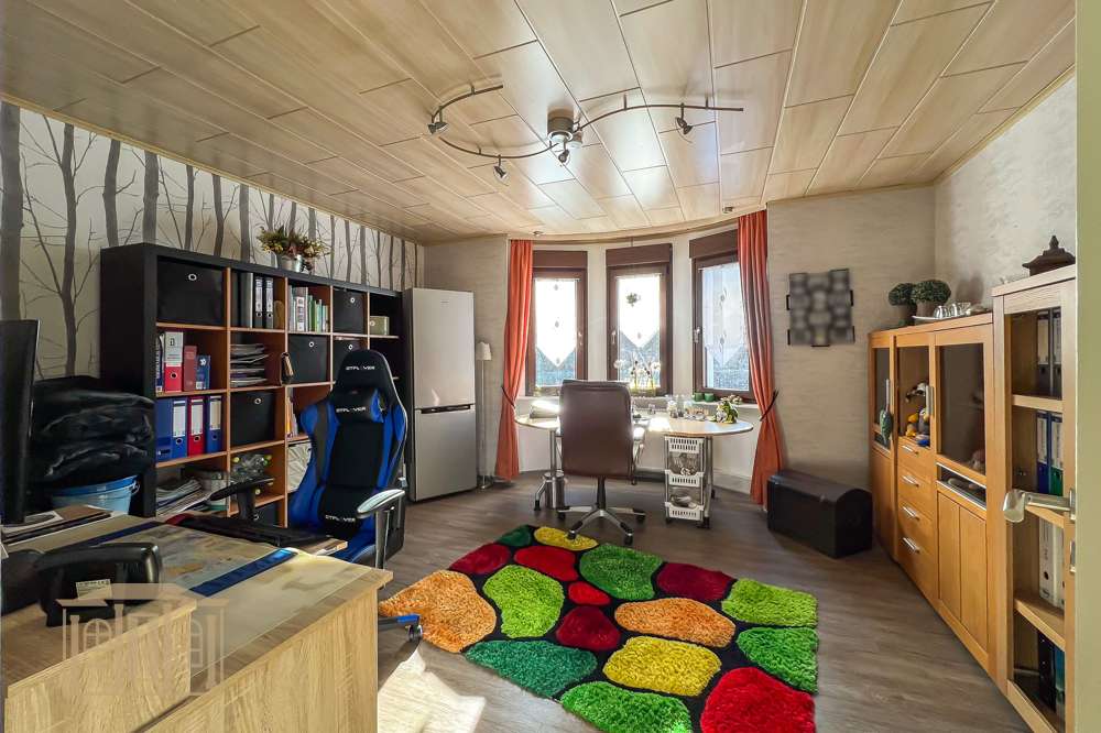 Immobilie in Lüdenscheid - Stilvoll modernisiert: Gemütliche Wohnung mit Kamin, Erker und Garten an der Volme - Bild 5