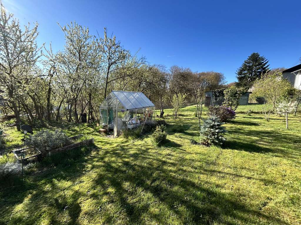 Immobilie in Horhausen (Westerwald) - Gemütliches Einfamilienhaus mit Garage in ruhiger Waldrandlage von Horhausen - Bild 2
