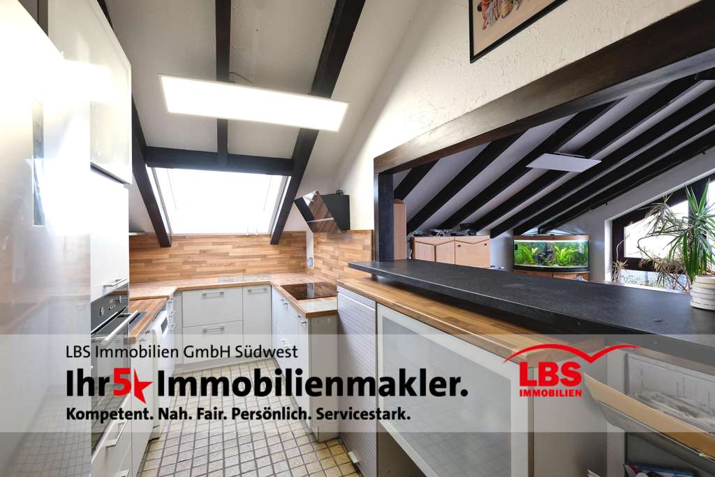 Immobilie in Rheinstetten - Großzügige 4-Zimmer-DG-Wohnung mit Kamin, Klima & TG-Stellplatz - Bild 2