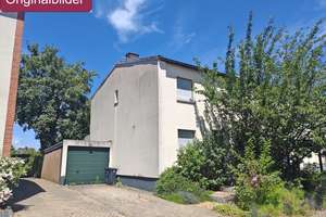 Zwangsversteigerung: Reihenendhaus mit Garten & Garage – ca. 40 % unter Verkehrswert