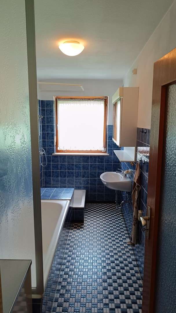 Immobilie in Retzstadt - Einfamilienhaus in ruhiger Lage, mit traumhaftem Ausblick und viel Entwicklungspotenzial - Bild 8