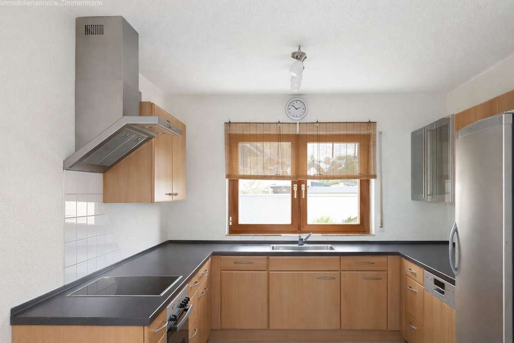 Immobilie in Renchen - Freistehendes Mehrfamilienhaus mit drei Wohneinheiten, Garten und guter Anbindung in Renchen - Bild 2