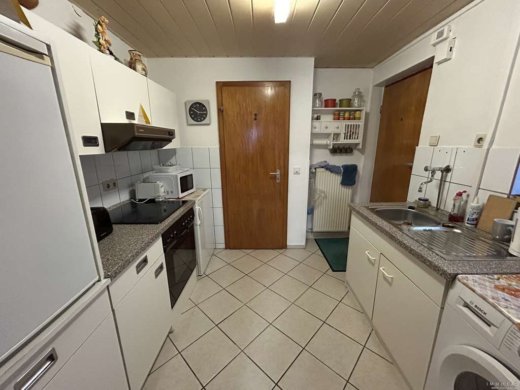 Immobilie in Merchweiler - Dreifamilienhaus mit angebautem Einfamilienhaus - Garten und 2 Garagen - Bild 4