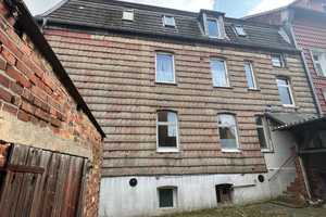 Mehrfamilienhaus mit 3 Wohneinheiten, 1 Ladeneinheit, Innenhof und Nebengebäude in Schöningen – Helmstedt (Kreis) – Vorschaubild 3