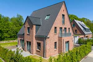 Exklusives Familienhaus Neubau A+ eingebettet in naturnahe Umgebung