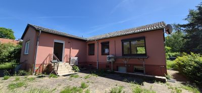Direkt am Elbdeich * Kleiner, feiner Bungalow auf großem Grundstück mit EBK, Kamin und Garage
