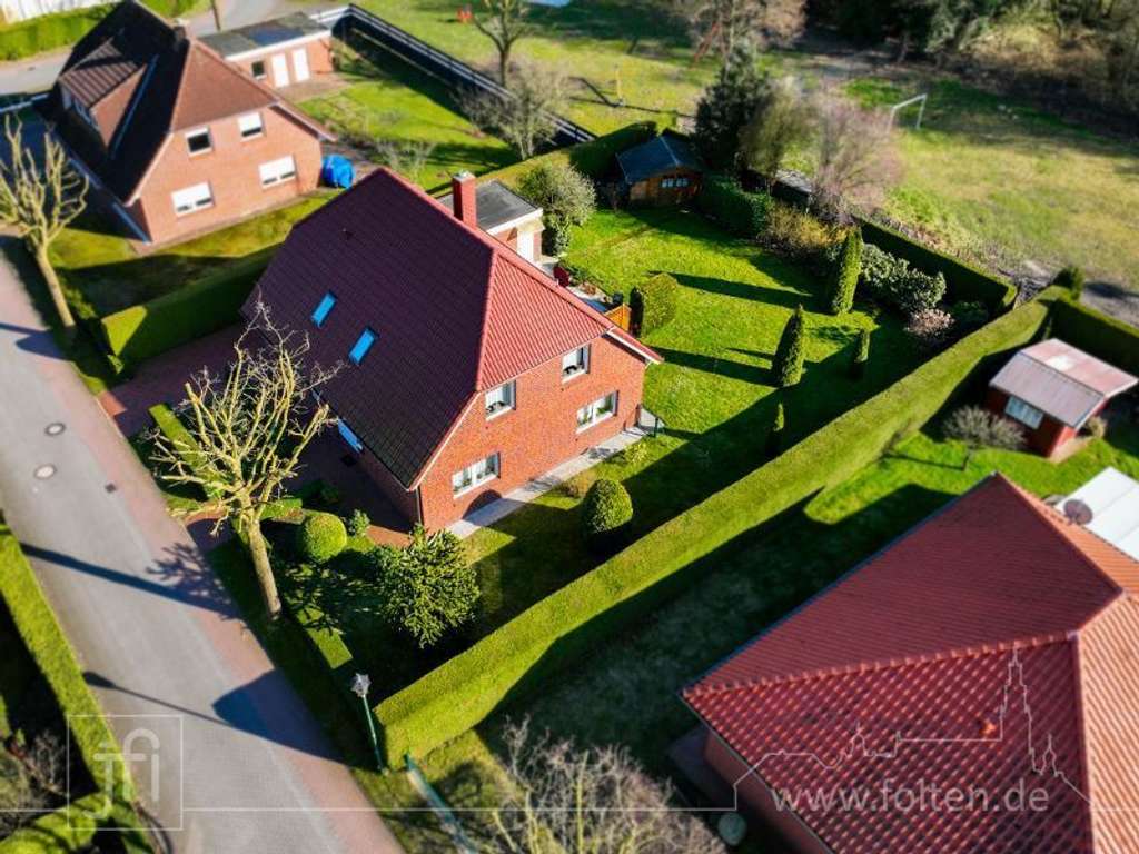 Immobilie in Detern - Sehr gepflegtes Einfamilienhaus in ruhiger Siedlungslage, inklusive Garage und neuwertigem Kaminofen - Bild 0