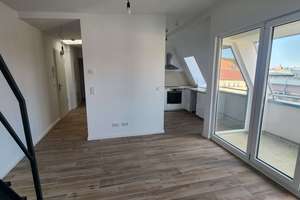 Elegante Dachgeschosswohnung in bester Kiezlage!
