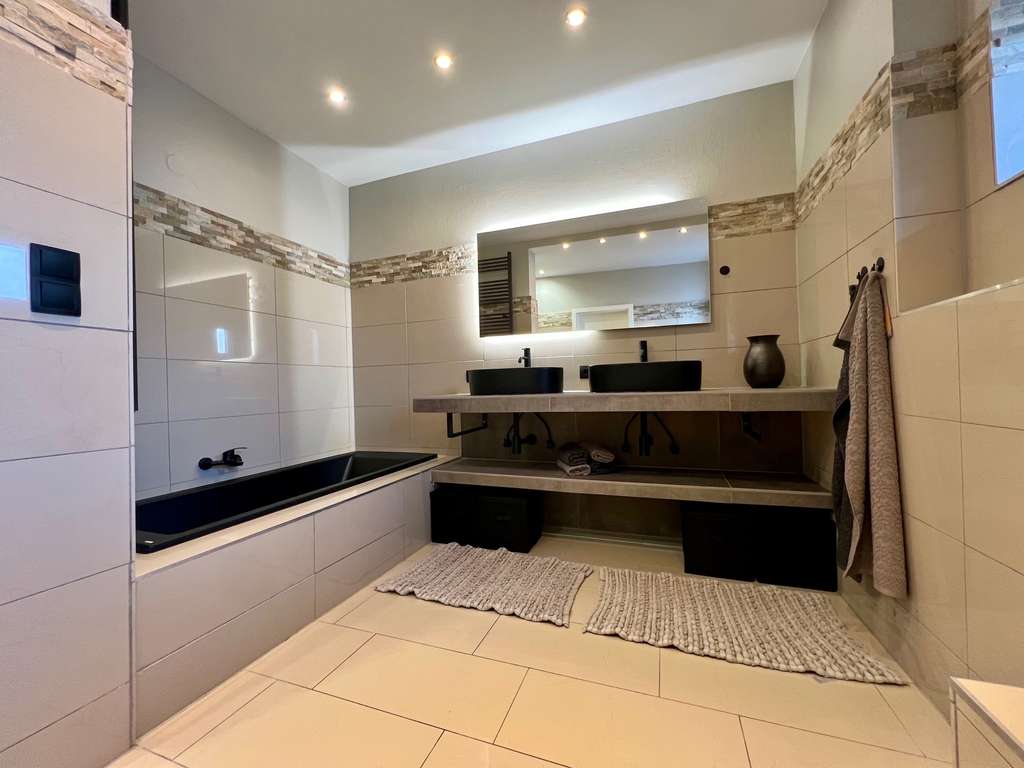 Immobilie in Bad Nenndorf - Stillvoll renovierte Erdgeschosswohnung mit großem Garten in idyllischer Feldrandlage! - Bild 4