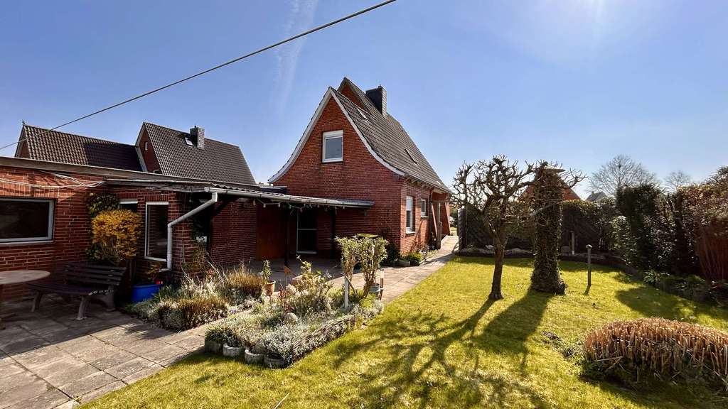 Immobilie in Cuxhaven - Einfamilienhaus mit großzügigem Grundstück und freiem Blick über die Felder in Cuxhaven-Lüdingworth - Bild 1
