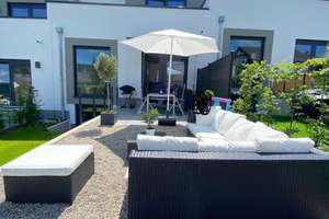 Exklusives Gartenhofhaus mit Garten, 2 Tiefgaragenstellplätzen und moderner Energietechnik
