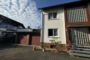 Einziehen oder vermieten · Einfamilienhaus mit Garten, zwei Garagen und sofortigem Ertrag – Die vollständige Adresse der Immobilie erhältst du vom Anbieter., 68642 Bürstadt – Vorschaubild 2