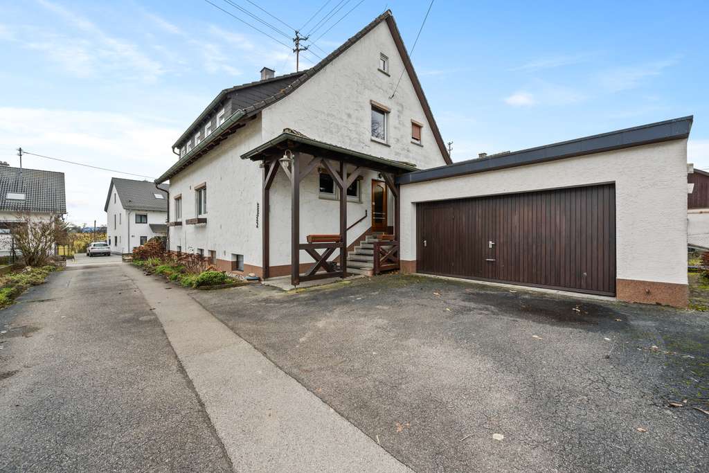 Immobilie in Haigerloch - Charmantes Einfamilienhaus mit Ausbaupotenzial, Scheune & Doppelgarage in guter Lage von Haigerloch - Bild 2