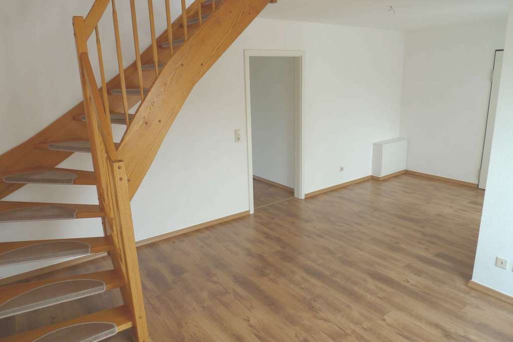 Immobilie in Neuruppin - Vermietete 3-Zimmer-Eigentumswohnung mit Balkon in zentraler Innenstadtlage - Bild 2