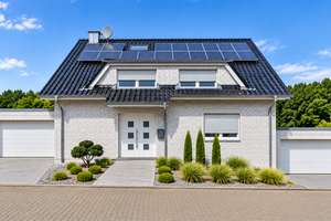 Energieeffizientes EFH mit 2 Erdwärmepumpen, PV, Indoor-Pool & Sauna