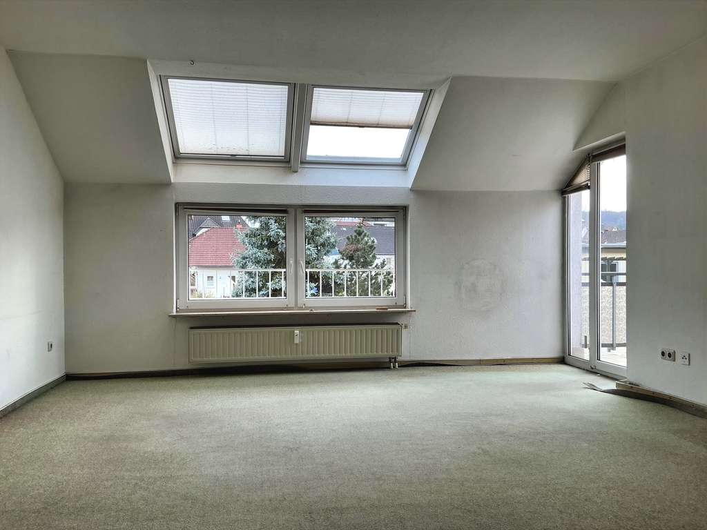 Immobilie in Hann. Münden - Wohnen in Hann Münden mit viel Licht und Raum im Dachgeschoss, 2 Zimmer ETW mit Garage, frei - Bild 2
