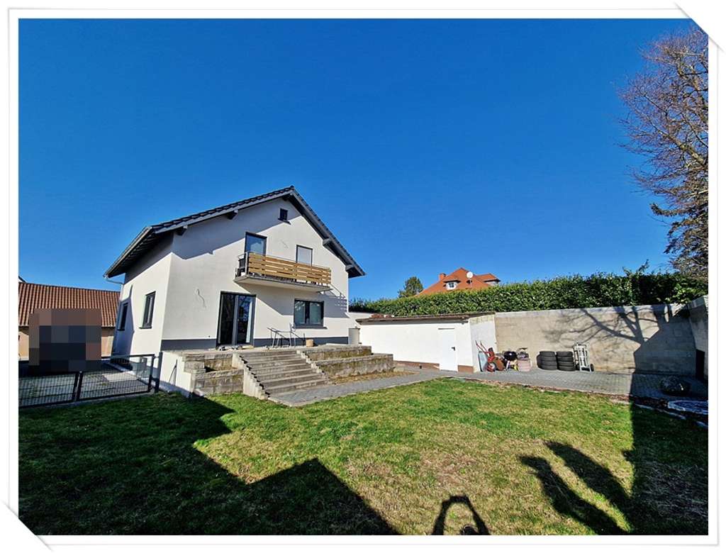 Immobilie in Hahnheim - Freistehendes sniertes EFH mit Charme++++ komplett unterkellert inkl Garage + 4 Stellplätze - Bild 1