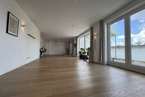 Provisionsfreie Dachgeschosswohnung mit Südbalkon, Klimaanlage & Stellplatz - barrierefrei!