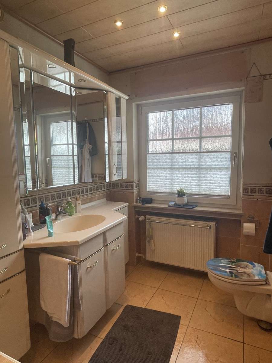 Immobilie in Florstadt - Einfamilienhaus im Bungalowstil mit großem Garten und Terrasse - Bild 16