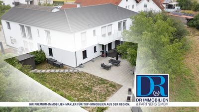 Neuwertige 3-Zi-Wohnung mit großzügigem Garten und Blick auf die Felder