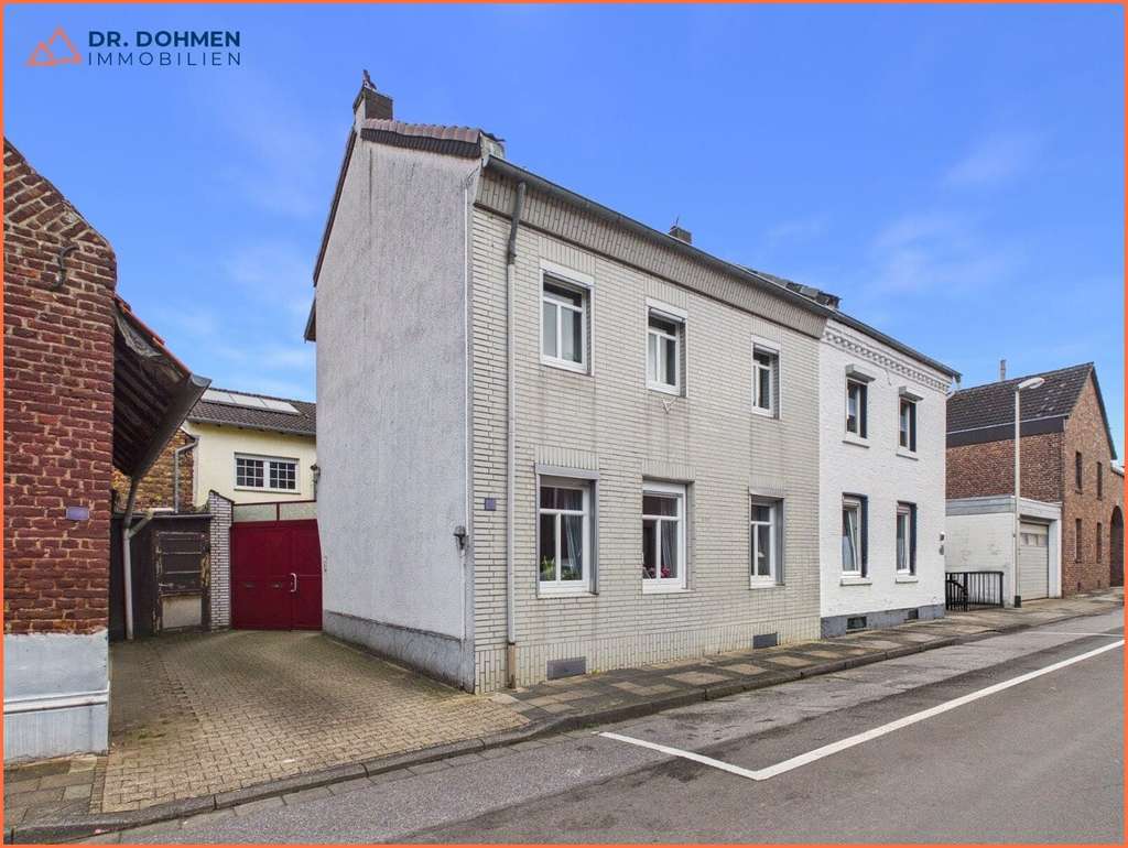 Immobilie in Hückelhoven - Gepflegtes Zweifamilienhaus mit Innenhof, Garage und großem Garten in Hückelhoven-Brachelen - Bild 2