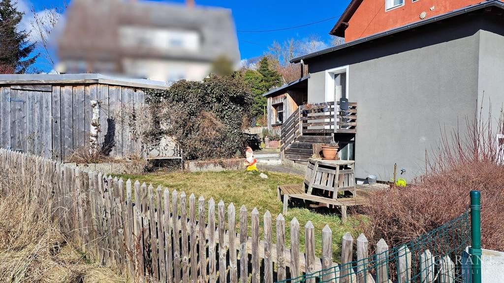 Immobilie in Feilitzsch - Charmantes Ein-/Zweifamilienhaus mit Vermietungspotenzial,  Kapitalanlage mit Perspektive - Bild 1