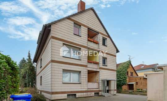 Attraktive 3-Zimmer-Erdgeschosswohnung - solide vermietet mit Loggia, Garage und Gartennutzung