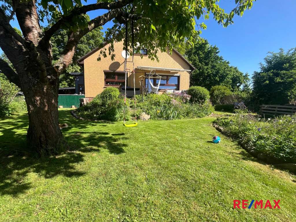 Immobilie in Algermissen - Charmantes Einfamilienhaus im Grünen Ideal für junge Familien - Bild 1