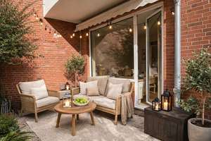 WOHNEN MIT TERRASSE UND BLICK INS GRÜNE