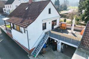 Charmantes Einfamilienhaus mit Dachterrasse, Garage und Garten - provisionsfrei für Käufer – Die vollständige Adresse der Immobilie erhältst du vom Anbieter., 97737 Gemünden am Main – Vorschaubild 2