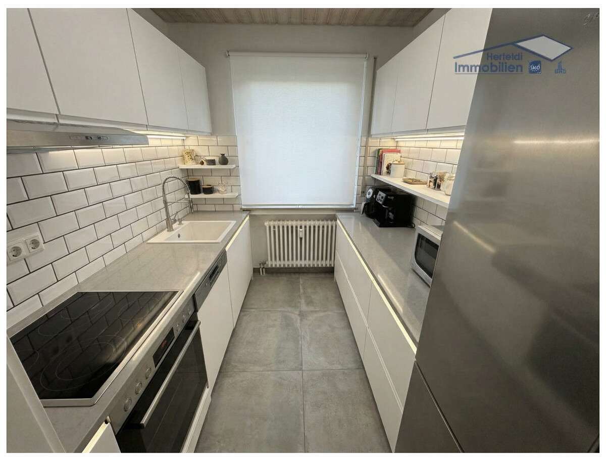 Immobilie in Kaufering - Modernisierte 3-Zimmer-Wohnung mit Süd-Balkon und TG-Stellplatz in zentraler Lage - Bild 6