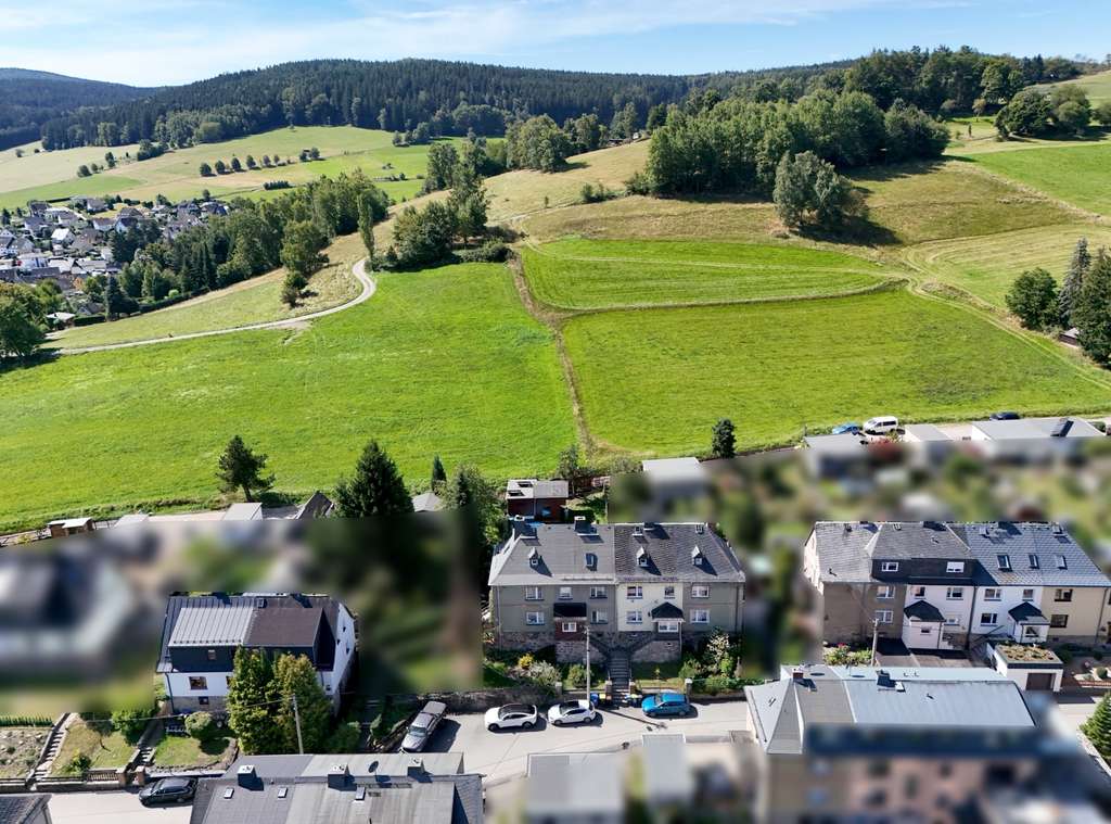 Immobilie in Lauter-Bernsbach - Kaufen, einziehen, wohlfühlen! Gemütliches, saniertes Reihenhaus mit Pool & Garage in Lauter - Bild 2