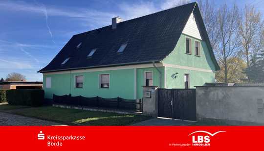 Bild von Zweifamilienhaus auf großem Grundstück!