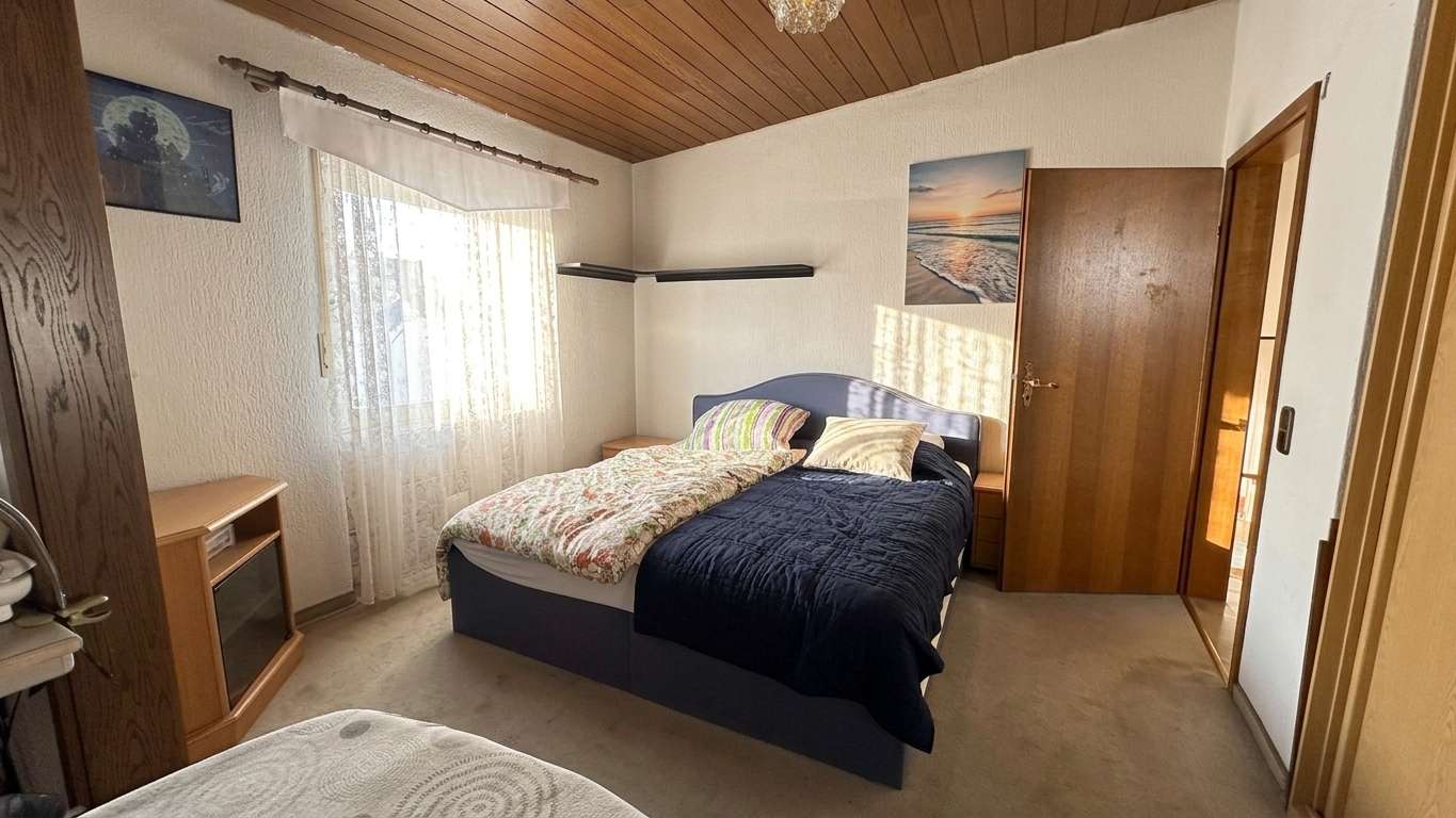 Immobilie in Essenheim - Vielseitiges Ein- bis Zweifamilienhaus mit Scheune und Kellerbar in Essenheim - Bild 5