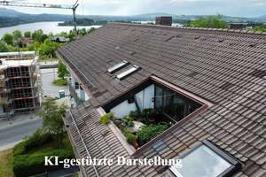 See- und Gebirgsblick ...  Dachgeschoss-Wohnung in zentraler Lage 
