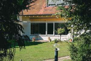 Grüne Oase in Stadtnähe: Einfamilienhaus mit Traumgarten in Degerloch