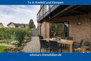 Für Paare mit Anspruch: Architektenhaus mit besonderer Raumstruktur und Wohlfühlgarten!