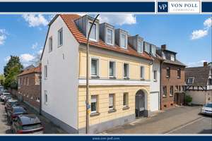 Rheinnahes Mehrparteienhaus mit Entwicklungspotenzial und freier Gewerbeeinheit