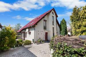 Architektur trifft Lebensqualität – modernes Familienparadies mit Garten, Gästehaus & Stil