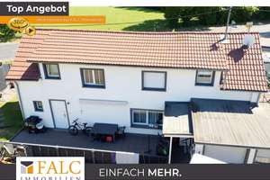 Einfamilienhaus mit Garten, drei Garagen und umfangreichen Modernisierungen