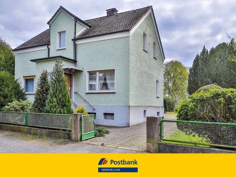 Freistehendes Zweifamilienhaus Mit Garten Und Grossem Grundstuck