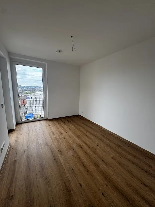 Exklusive 3-Zimmer-Wohnung im Neubau mit Dachterrasse & Aufzug - Photo 4