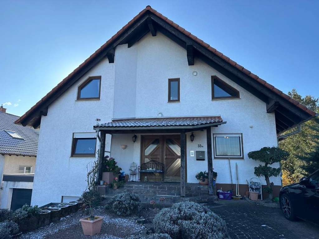 Immobilie in Kirchheimbolanden - Gepflegtes Mehrfamilienhaus mit schönem Garten 4 Stellplätze und Garage - Bild 1