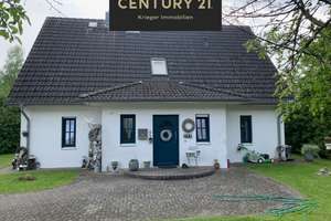Schickes Einfamilienhaus + Gewerbe auf einem Grundstück in Munster!