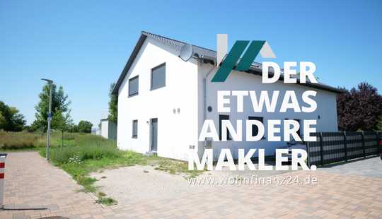 Bild von Neuwertiges Einfamilienhaus mit großer Einliegerwohnung in Feldrandlage!