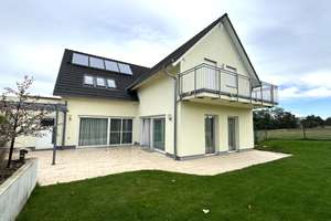 Modernes Einfamilienhaus mit Galerie, Kamin und drei Garagen in ruhiger Randlage – Im Förstergarten 31, 91336 Heroldsbach – Vorschaubild 16