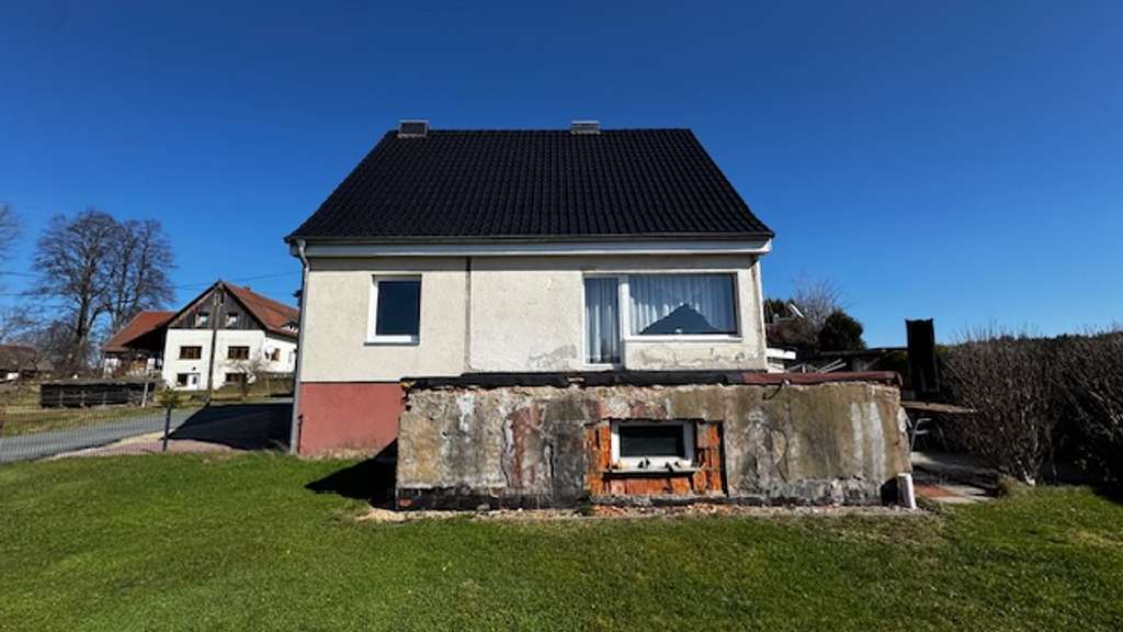 Immobilie in Reichenbach/Oberlausitz - Freistehendes Einfamilienhaus (EW65) mit Keller und Garage auf landschaftlich reizvollem Grundstück - Bild 3