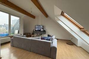 Lichtdurchflutete Dachgeschosswohnung mit Charme, Weitblick und hohem Wohnkomfort