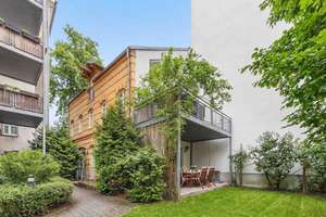 Wohnung mit Townhouse Charakter - Remise mit offener Galerie und großen Terrassen