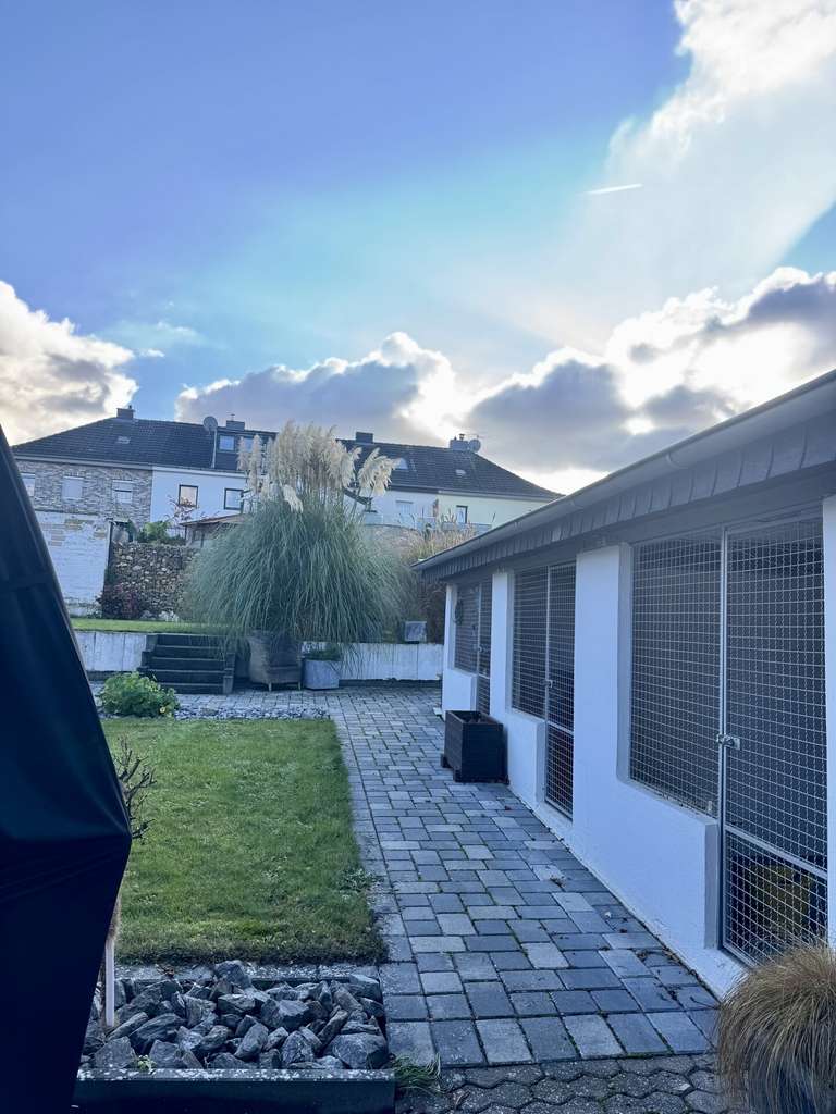 Immobilie in Übach-Palenberg - Mehr Raum für Ideen: Reihenmittelhaus mit Einliegerwohnung und Garten in Übach-Palenberg. - Bild 3